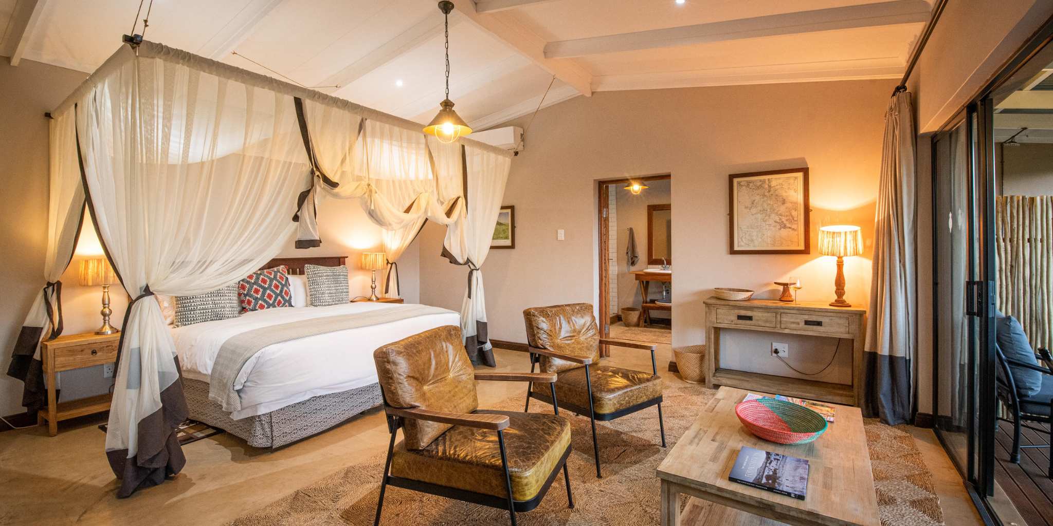 Luxury room featuring large canopy bed