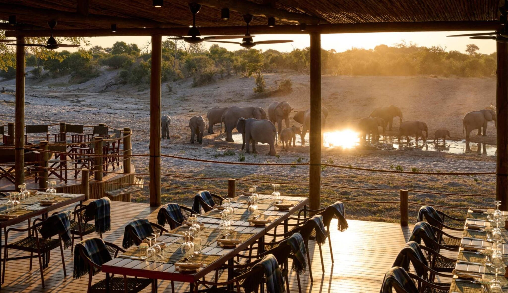 Savute Safari Lodge luxury dining area at sunset