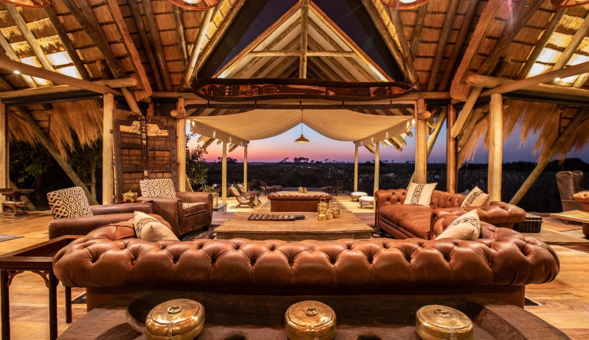 Selinda Camp lounge looking out on beautiful sunset