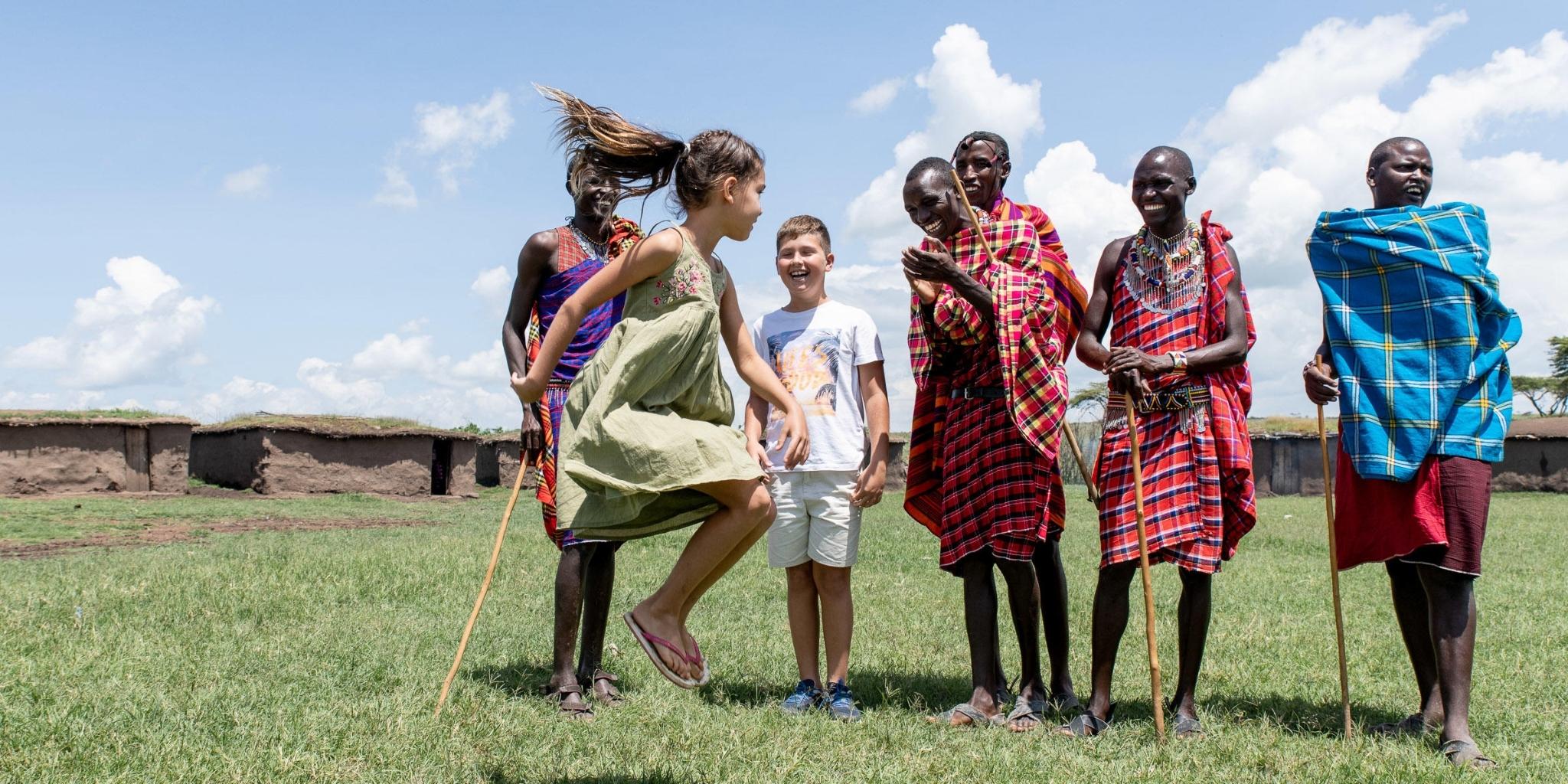 Girl learning to jump like the Maasai
