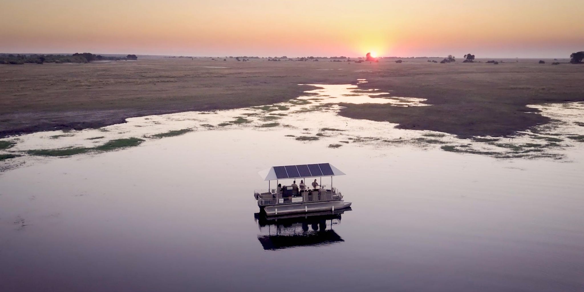 Boat excursion in Chobe River at sunsrise