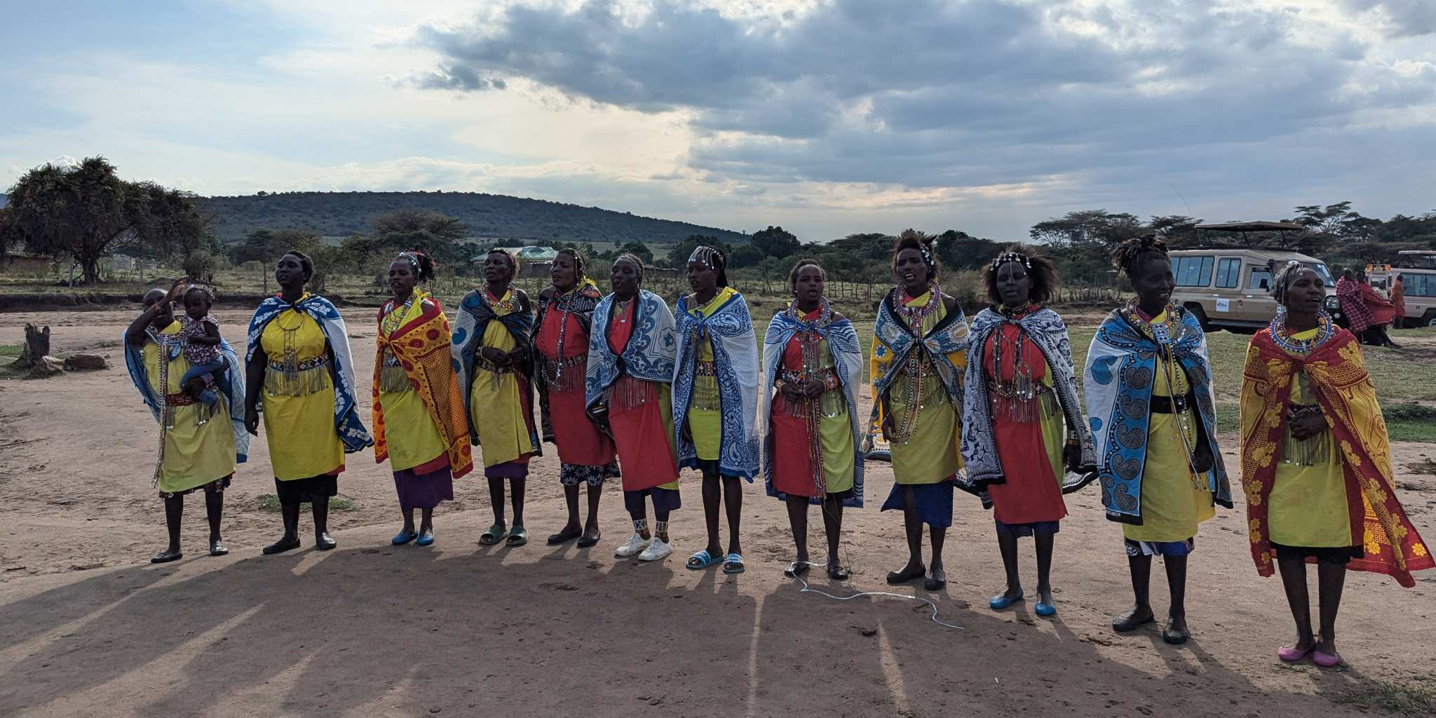 People stood in a line from a Maasai village