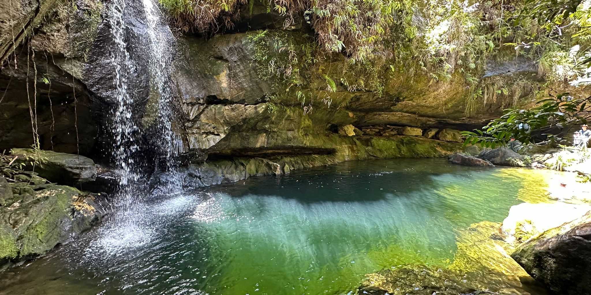 Bright blue waterfall in caves