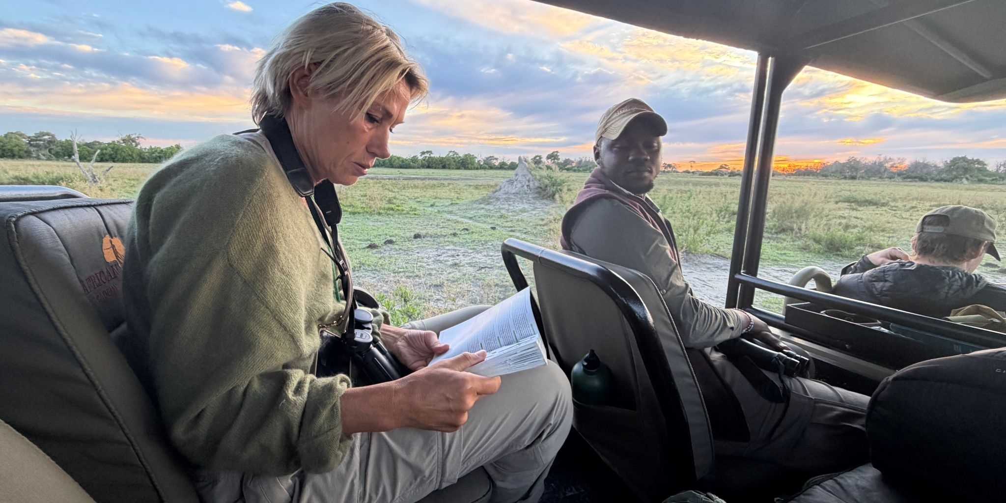 Inside safari vehicle with Kwapa training camp students