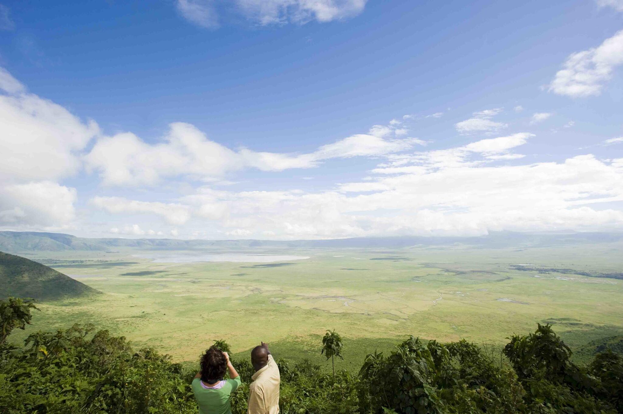 Couple looking at view of Ngorongoro crater