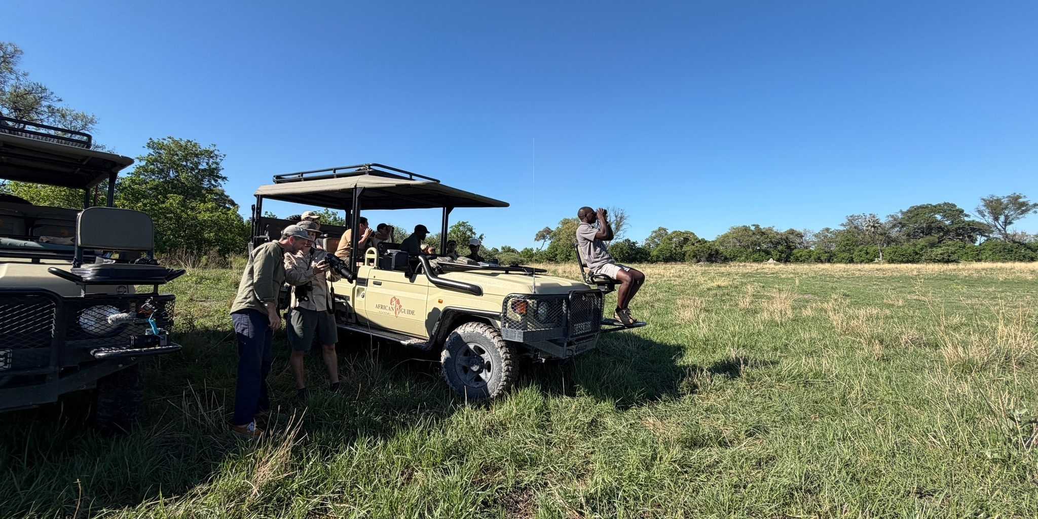 image of Kwapa training camp group in safari vehicle