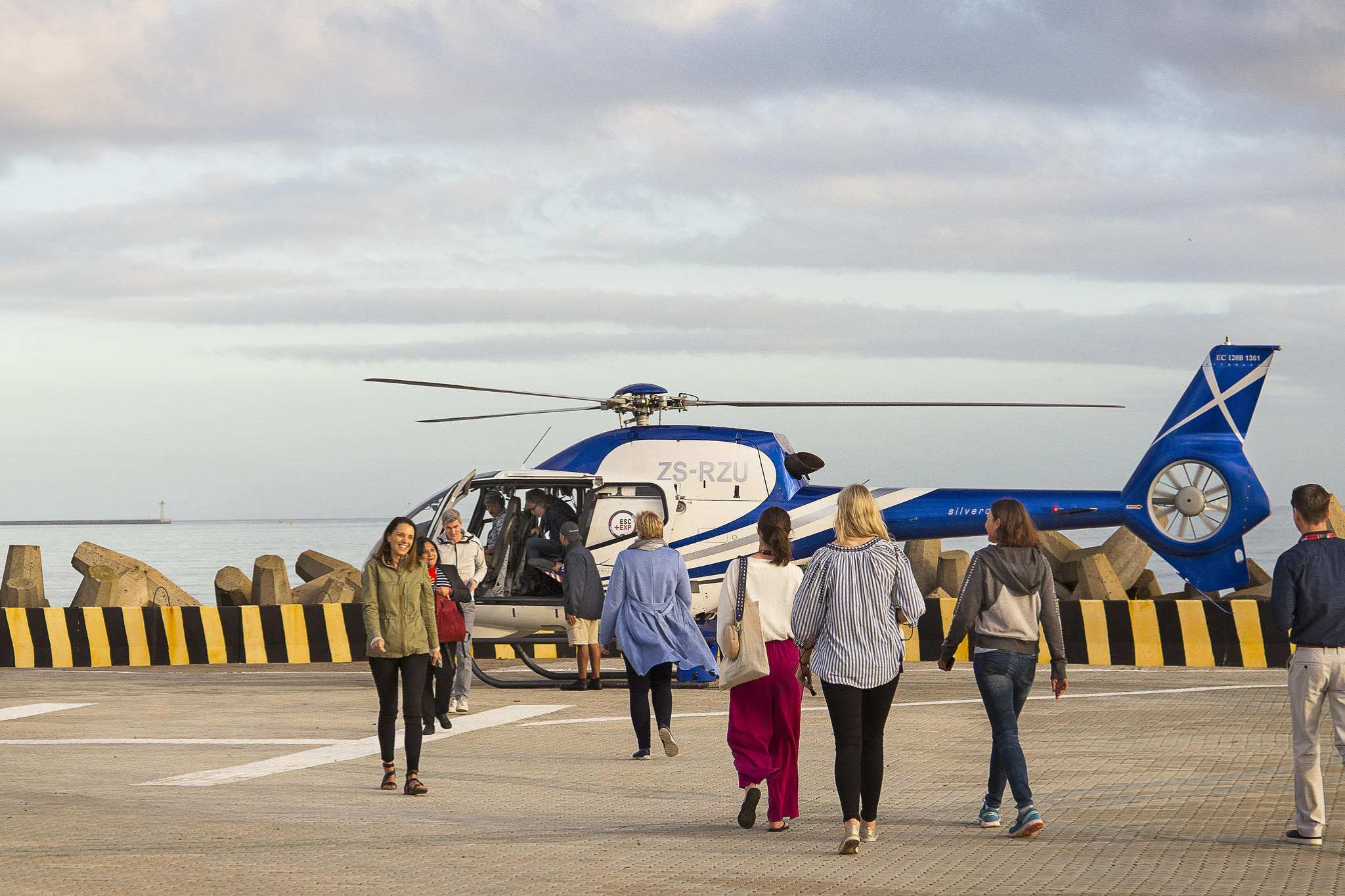 People boarding a helicopter to go for a flight up Table Mountain in Cape Town