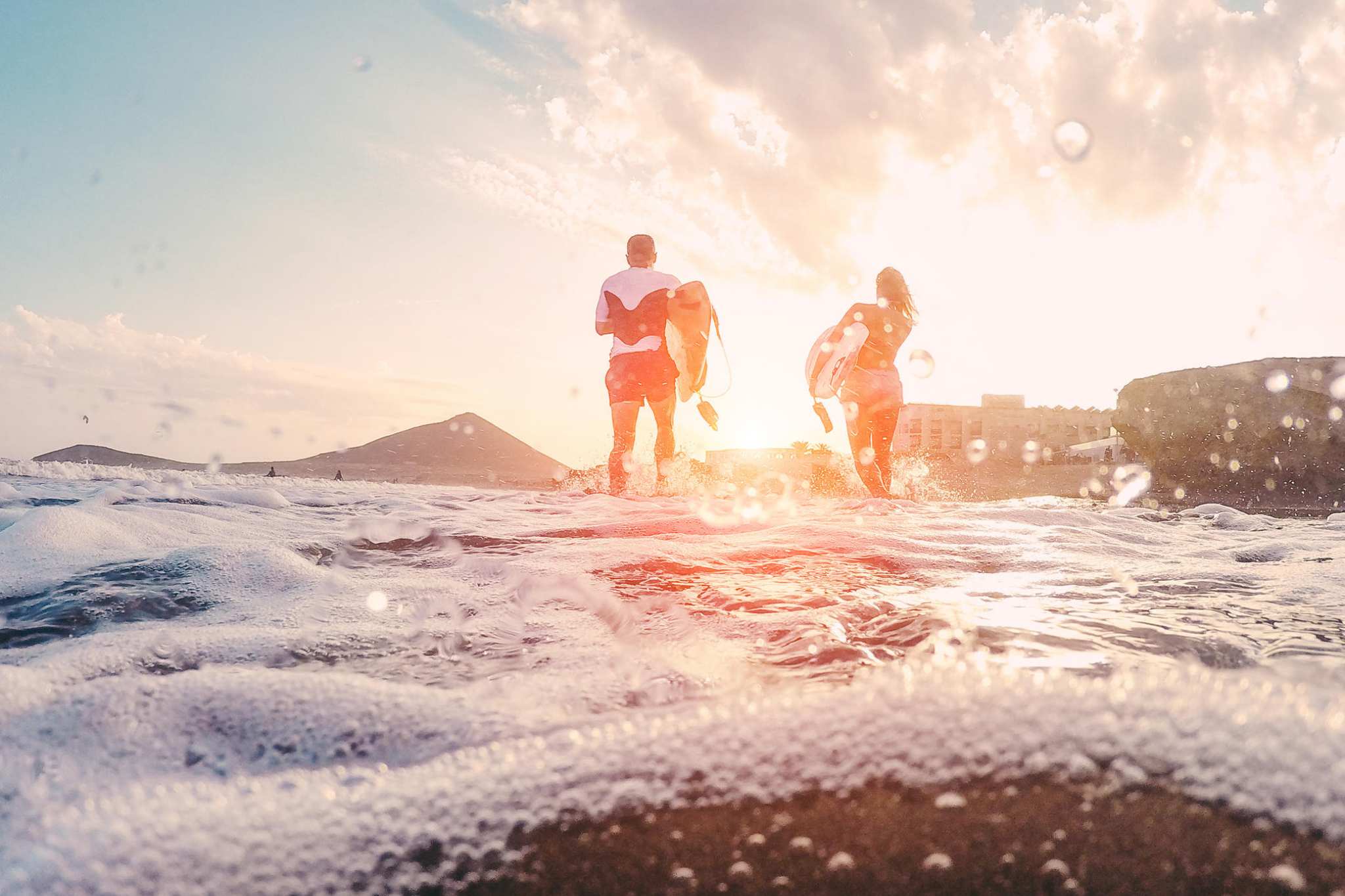A couple surfing in Cape Town